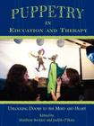 Puppetry in Education and Therapy: Unlocking Doors to the Mind and Heart By Matthew Bernier Cover Image
