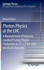 Photon Physics at the Lhc: A Measurement of Inclusive Isolated Prompt Photon Production at √s = 7 TeV with the Atlas Detector (Springer Theses) By Michael Hance Cover Image