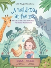 A Wild Day at the Zoo - Bilingual Hawaiian and English Edition: Children's Picture Book Cover Image