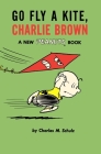 Go Fly a Kite, Charlie Brown: A New Peanuts Book By Charles M. Schulz Cover Image