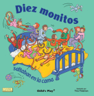 Diez Monitos Saltaban en la Cama = Ten Little Monkeys Jumping on the Bed (Classic Books with Holes 8x8) By Tina Freeman Cover Image