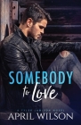 Somebody to Love: (A Tyler Jamison Novel) By April Wilson Cover Image