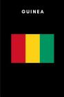 Guinea: Country Flag A5 Notebook to write in with 120 pages By Travel Journal Publishers Cover Image