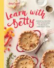 Betty Crocker Learn With Betty: Essential Recipes and Techniques to Become a Confident Cook (Betty Crocker Cooking) By Betty Crocker Cover Image
