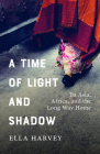 A Time of Light and Shadow: To Asia, Africa, and the Long Way Home By Ella Harvey Cover Image