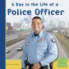 A Day in the Life of a Police Officer (Community Helpers at Work) Cover Image
