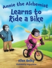 Annie the Alchemist Learns to Ride a Bike By Ellen Hefty Cover Image