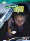 Investigating Light (Searchlight Books (TM) -- How Does Energy Work?) By Sally M. Walker Cover Image