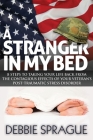 A Stranger in My Bed: 8 Steps to Taking Your Life Back from the Contagious Effects of Your Veteran's Post-Traumatic Stress Disorder By Debbie Sprague Cover Image