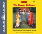 The Mystery of the Haunted Boxcar (Library Edition) (The Boxcar Children Mysteries #100) Cover Image