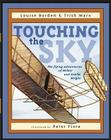 Touching the Sky: The Flying Adventures of Wilbur and Orville Wright By Louise Borden, Trish Marx, Peter M. Fiore (Illustrator) Cover Image
