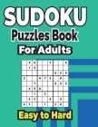 Sudoku Puzzles Book 500+ Easy to Hard Puzzles for Adults: Sharp Your Brain with ultimate sudoku puzzles. Cover Image