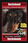 Dachshund Training Book for Dachshund Dogs & Puppies By BoneUP DOG Training, Dog Care, Dog Behavior, Hand Cues Too! Are You Ready to Bone Up? Easy Tra By Karen Douglas Kane Cover Image
