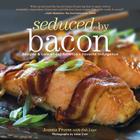 Seduced by Bacon: Recipes & Lore about America's Favorite Indulgence Cover Image