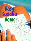 Easy Sudoku Book: Sudoku Brain Game Puzzle Book Cover Image