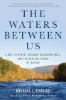 The Waters Between Us: A Boy, a Father, Outdoor Misadventures, and the Healing Power of Nature By Michael Tougias Cover Image