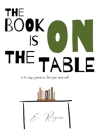 The book is on the table By E. Regier Cover Image