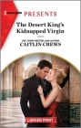 The Desert King's Kidnapped Virgin By Caitlin Crews Cover Image