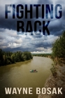 Fighting Back: Ranchers are Fighting Back asainst the Drug Runners By Wayne Bosak Cover Image