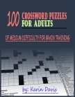 100 crossword puzzles for adults: Сrossword puzzles for adults of medium difficulty for brain training By Karin Davis Cover Image