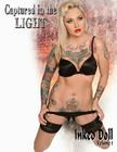 Captured in the LIGHT: Inked Doll By Michael Enoches (Photographer), Michael Enoches Cover Image