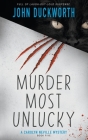 Murder Most Unlucky: A Cozy Mystery Cover Image